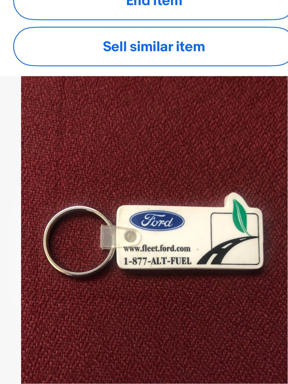 Vintage Ford White Keychain with Green Leaf and Blue Logo